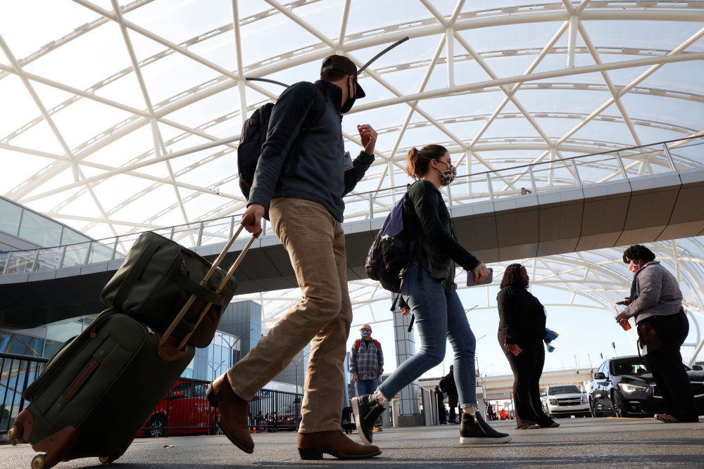 Passengers depart Hartsfield–Jackson Atlanta International Airport ahead of the Thanksgiving holiday