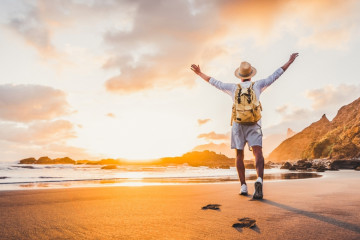 Happy,Man,With,Hands,Up,Enjoying,Wellbeing,And,Freedom,At