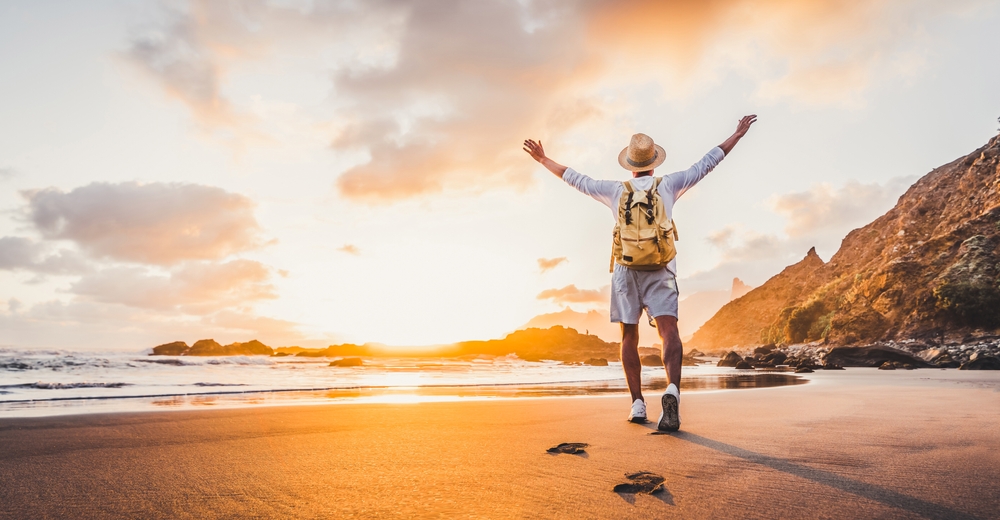 Happy,Man,With,Hands,Up,Enjoying,Wellbeing,And,Freedom,At