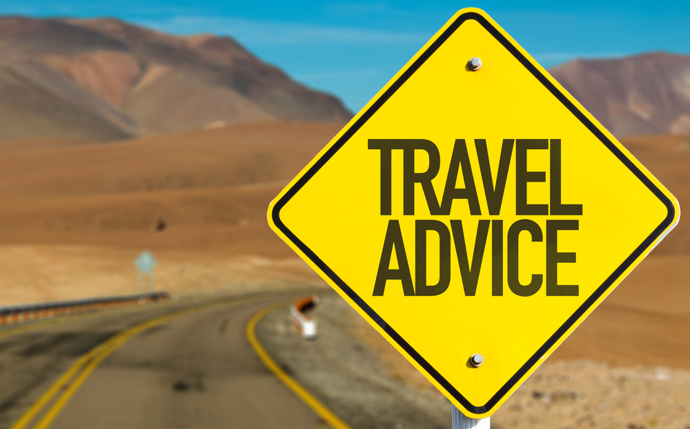 Travel,Advice,Sign,On,Desert,Road