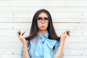 Funny,Woman,Checking,Her,Hair,For,Split,Ends,Cute,Brunette