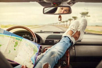 Young,Woman,Alone,Car,Traveler,With,Map