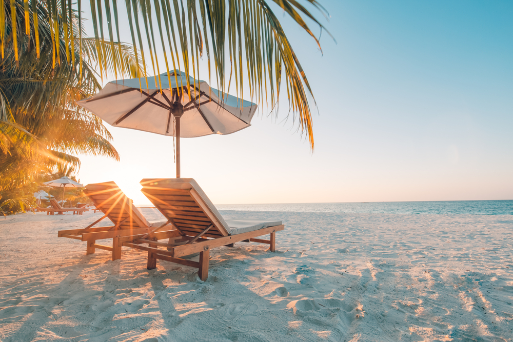 Beautiful,Beach.,Chairs,On,The,Sandy,Beach,Near,The,Sea.