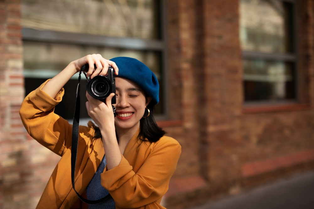 Beautiful,Chinese,Woman,With,Camera.,Happy,Smiling,Woman,Taking,Photos