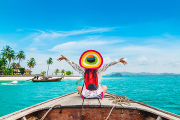 Happy,Traveler,Woman,Relaxing,On,Boat,Joy,Fun,Scenic,Tropical