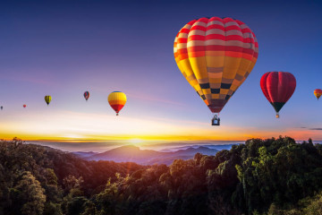 Colorful,Hot,Air,Balloons,Flying,Over,Mountain,At,Dot,Inthanon