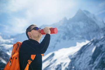 Hiker,Hydration.,Hiker,Drinking,Water,From,Water,Bottle