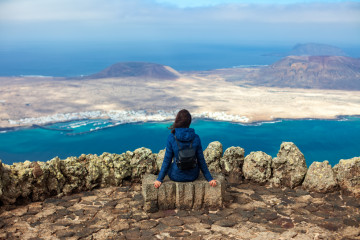 Traveler,Woman,Enjoying,Beautiful,Seascape,At,Viewpoint,On,Island.,Travel