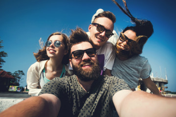Multiracial,Group,Of,Young,Hipster,Friends,Make,Selfie,Photo,With