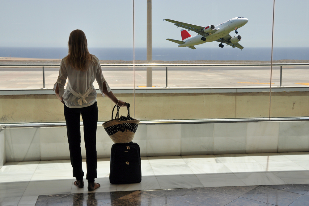 Girl,At,The,Airport,Window