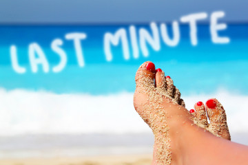 Legs,On,The,Beach,As,Concept,For,Last,Minute,Offer