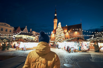 Rear,View,Of,Man,In,Warm,Clothing,During,Night,Walk