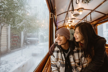 Portrait,Of,Young,Asian,Man,And,Woman,Looking,At,The