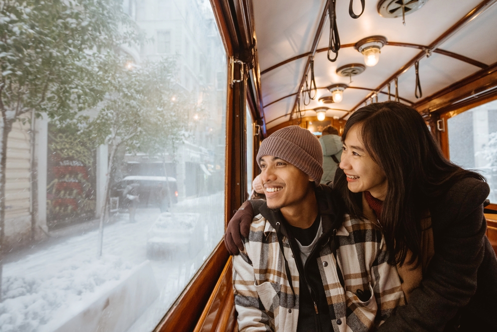 Portrait,Of,Young,Asian,Man,And,Woman,Looking,At,The