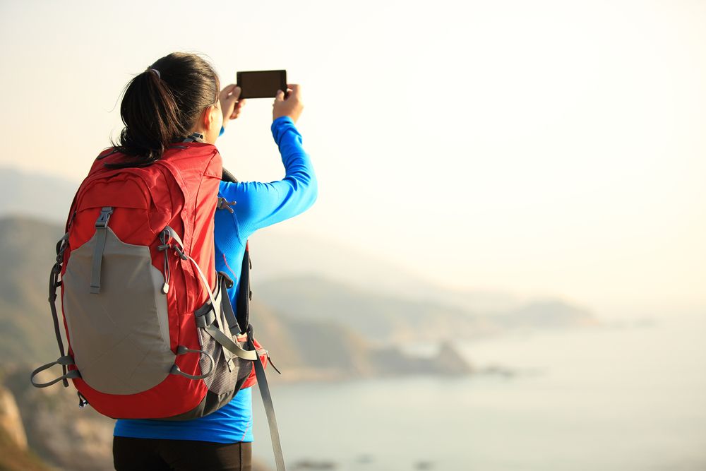 Hiking,Woman,Use,Smart,Phone,Taking,Photo