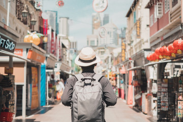 Young,Man,Hipster,Traveling,With,Backpack,And,Hat,,Happy,Solo