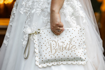 New,Beautiful,Bride,Just,Married,Holding,Hand,Bag,With,Bride