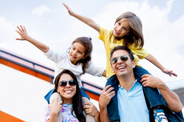 Happy,Family,Wth,Two,Kids,Traveling,By,Airplane