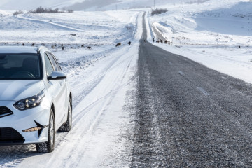 White,Car,On,The,Side,Of,The,Winter,Road