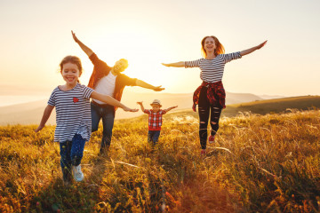 Happy,Family:,Mother,,Father,,Children,Son,And,Daughter,On,Nature