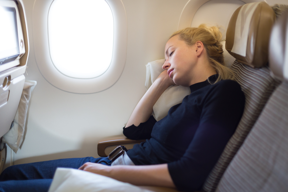 Tired,Blonde,Casual,Caucasian,Lady,Napping,On,Seat,While,Traveling