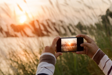 Closeup,Hand,Using,Phone,Similar,To,Smart,Phone,Style,Taking