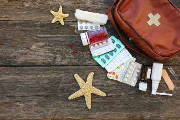 First,Aid,Kit,On,Old,Wooden,Background.,Concept,Of,Medication