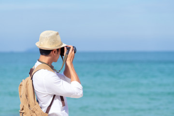 Candid,Of,Young,Attractive,Asian,Man,Hold,Camera,Taking,Photo