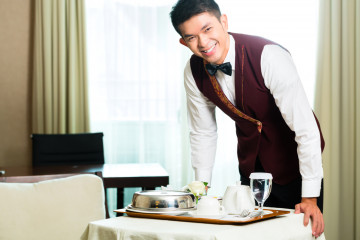Asian,Chinese,Room,Service,Waiter,Or,Steward,Serving,Guests,Food