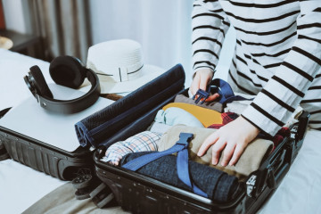 Traveler,Packing,Suitcase,For,Upcoming,Journey