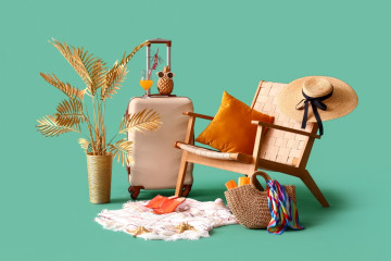 Suitcase,With,Chair,,Fresh,Orange,Juice,And,Beach,Accessories,On